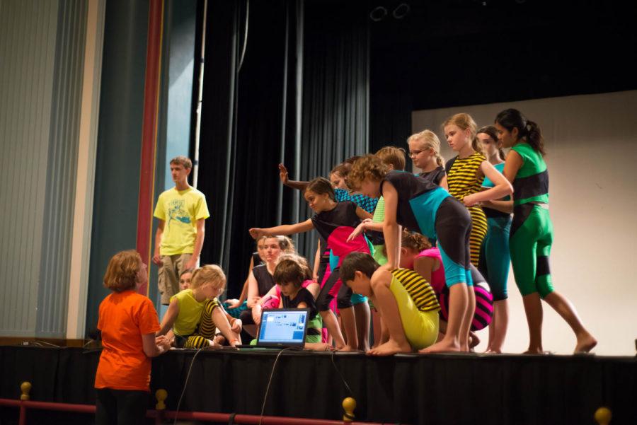 Director Valerie Williams is giving a speech to the kids after the Kids' Co'Motion full rehearsal ended.