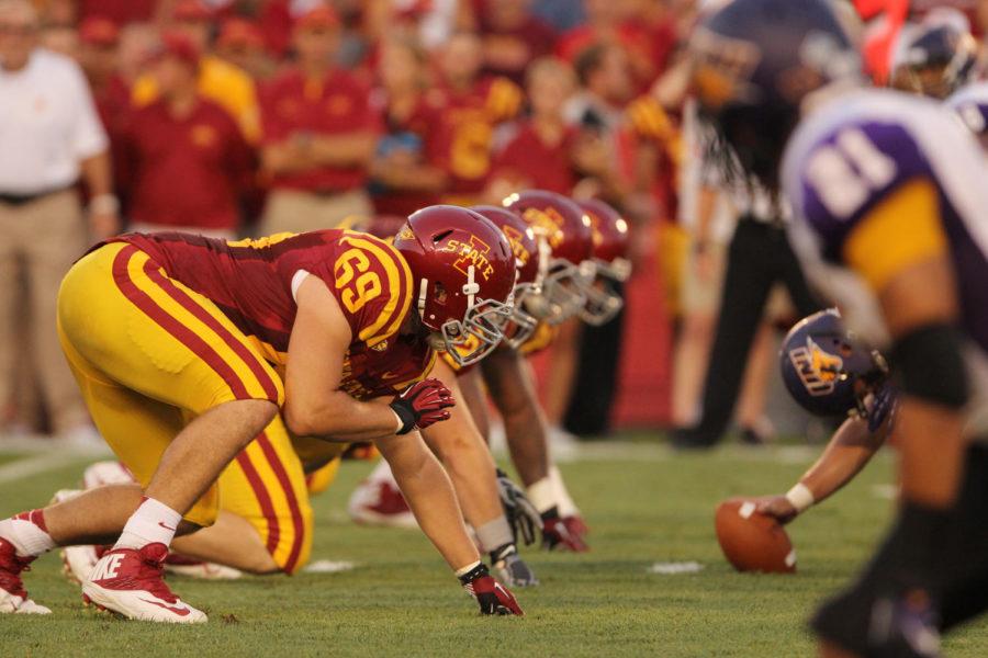 The Cyclones defensive line sets up for a play on August 31, 2013 at Jack Trice Stadium. The Cyclones fell to the Northern Iowa Panthers 20-28.