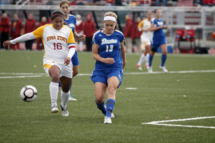 Iowa States Jennifer Dominguez battles Drakes Tori Flynn for possession of the soccer ball Sunday, Oct. 14, at the Cyclone Soccer Complex. The Cyclones defeated the Bulldogs 3-0.
