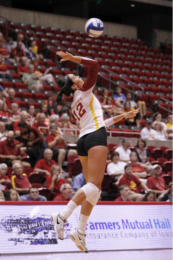 Redshirt junior Tory Knuth serves the ball for the Gold team in the ISU volleyball teams Cardinal and Gold scrimmage on Aug. 24 at Hilton Coliseum.
