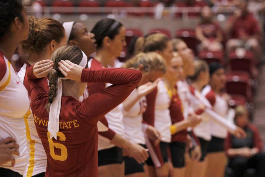 Senior Kristen Hahn steps out of line to fix her hair during the pregame of the Cardinal and Gold Scrimmage on Aug. 24 at Hilton Coliseum. As a senior, Hahn is considered one of the leaders on the team.