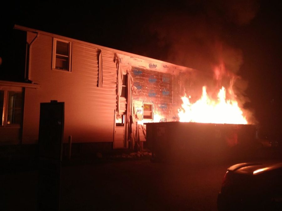 Flames engulf the dumpster at 301 Stanton on Saturday, Aug. 17. Photo courtesy of Brandon Amerine.