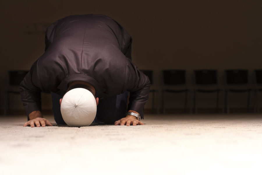 A member of the Darul Arqum Islamic Center in Ames prays during salat, the Islam pillar of prayer. Muslims pray toward Kaaba, a sacred building in Mecca. Islam is a peaceful religion, contradicting the prejudices formed after the 9/11 terrorist attacks. 