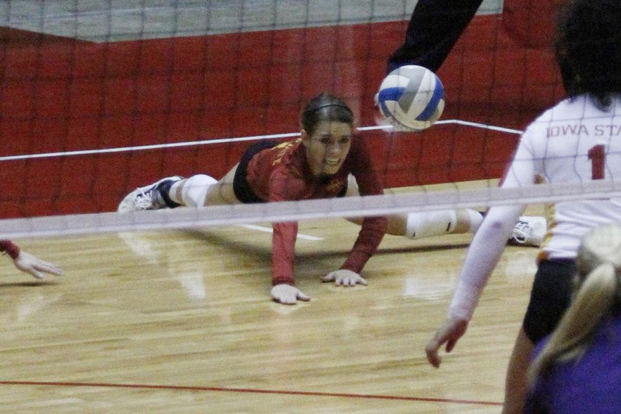 Senior Kristen Hahn goes for the dig against Northern Iowa on April 13, 2013, at Hilton Coliseum.  The Cyclones won their second match of their spring tournament 28-26, 25-17, 15-5.
