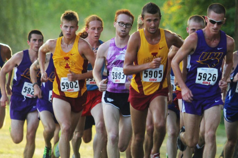 ISU cross-country runners freshman Jordan Schulze and sophomore Steve Dado charge up a hill during the Bulldog 4K Classic on Friday, Aug 30, at Ewing Park in Des Moines.