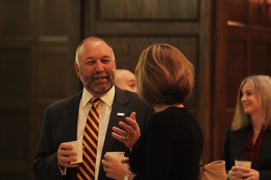 ISU President Steven Leath talks to attendees before his Annual Address on Friday, Sept. 13, in the Great Hall of the Memorial Union.