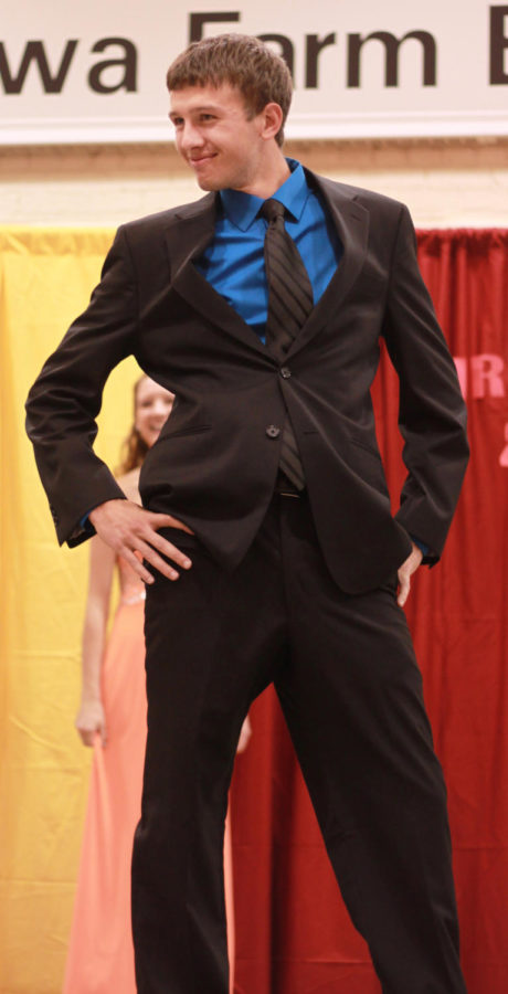 Andrew+Luzum%2C+junior+in+agricultural+business%2C+models+his+suit+during+the+evening+wear+portion+of+the+Mr.+CALS+pageant.