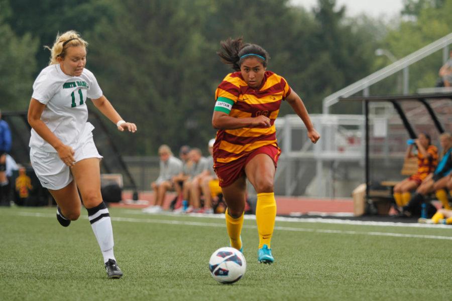 No. 16 senior forward Jennifer Dominguez attacks the heart of the North Dakota defense during Iowa States 4-0 rout of North Dakota on Sept. 8 at the Cyclone Sports Complex. Dominguez scored a goal and had an assist as well.