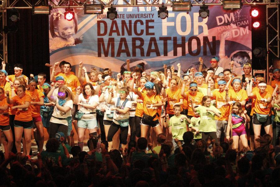 Dance Marathon members gather on stage during the Power Hour when everyone dances during the final hour of the fundraiser on Saturday, Jan. 26, at the Memorial Union. 
