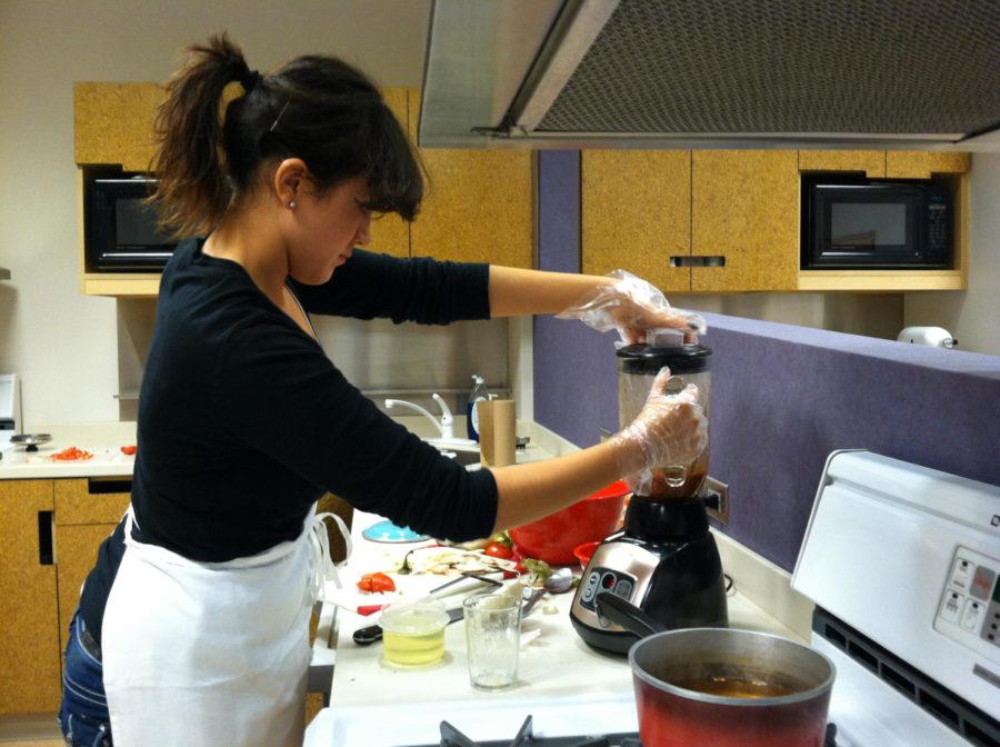 Daniela Gutierrez cooks a Latino-inspired dish for "Top Chef Latino" during Latino Heritage Month on Oct. 11, 2012.