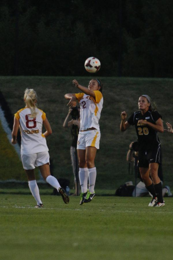 No. 12 freshman defender Madi Ott heads the ball during the Iowa game on Friday, Sept. 6, at the Iowa Soccer Complex in Iowa City. The Cyclones fell to the Hawkeyes 3-0. 