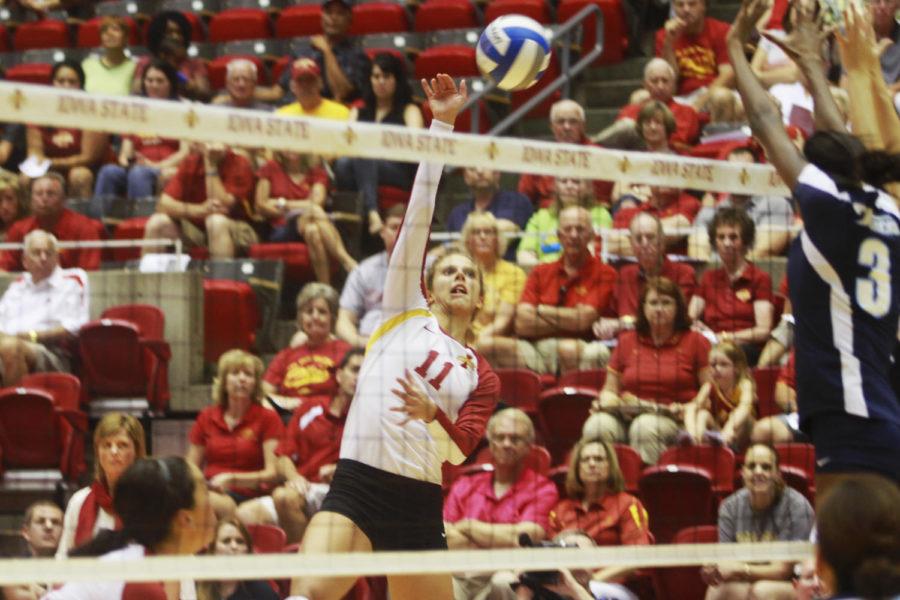 Freshman outside hitter Ciara Capezio hits the ball from her outside position Friday, Sept. 6, against San Diego. The spike scored a point for the Cyclones, but Iowa State dropped its first match of the season, 3-1. 