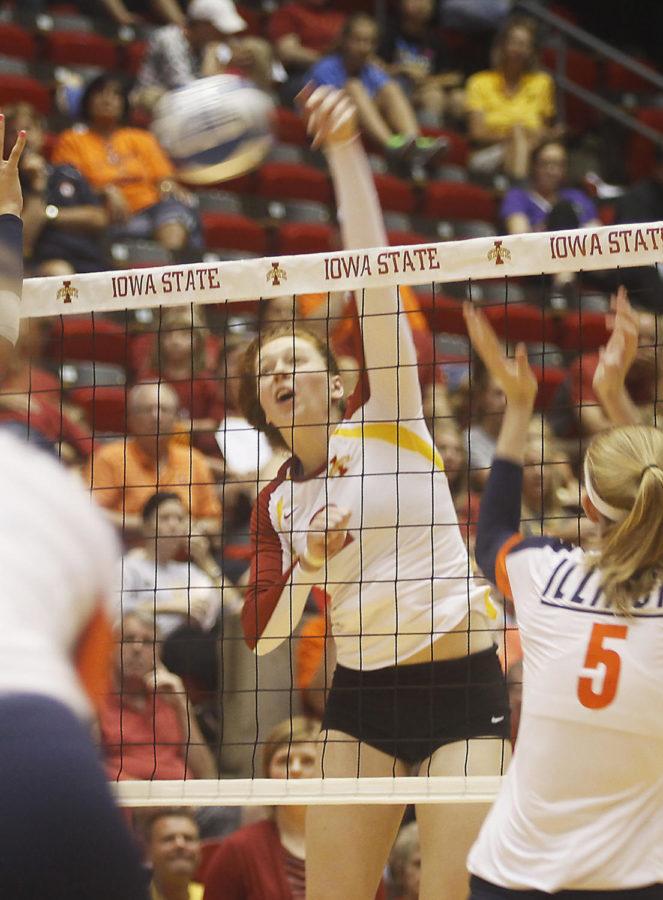 Right side hitter Mackenzie Bigbee hits a set over the net and past her single blocker. Bigbee had 14 of the total 34 kills by Iowa State in the match up.