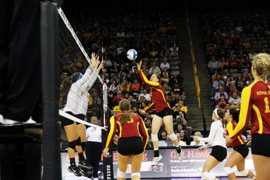 Sophomore Mackenzie Bigbee spikes the ball against Iowa on Saturday, Sept. 21, at the Carver-Hawkeye Arena in Iowa City. The Cyclones defeated the Hawkeyes, winning three out of four sets.