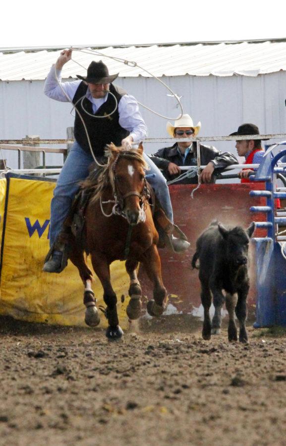 Sam Olson, of Black Hills State University, competes in the tie-down roping event during the Cyclone Stampede Rodeo on Oct. 5.
