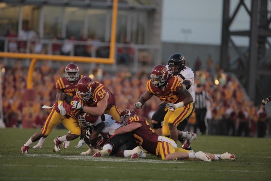 Cyclones tackle a Red Raiders player during the game against Texas Tech on Saturday, Sept. 29, at Jack Trice Stadium. Cyclones lost 24-13. 
