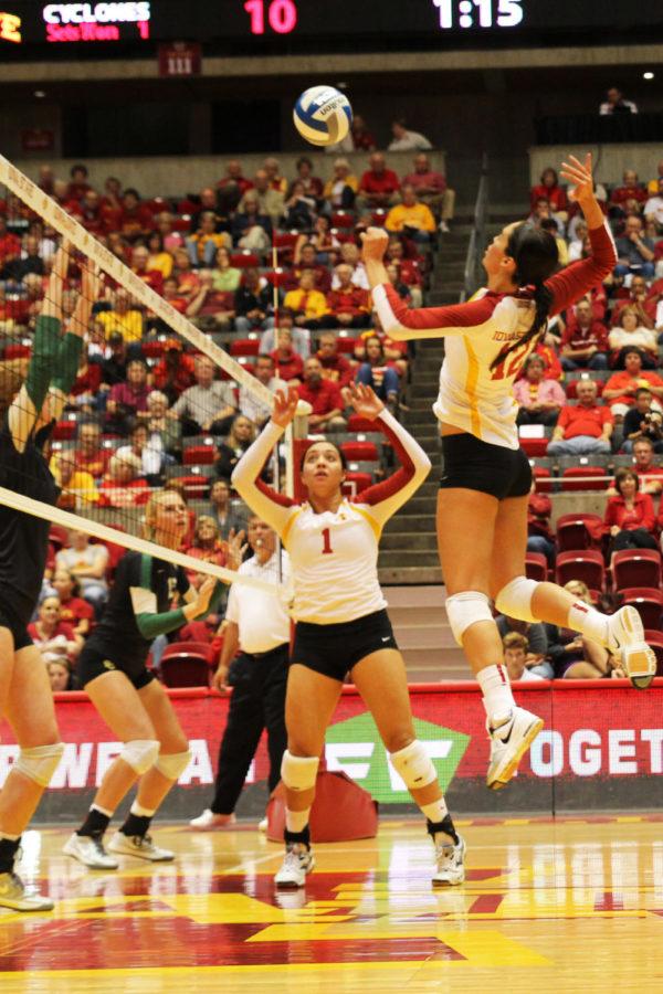 Assisted by sophomore Jenelle Hudsons set, redshirt sophomore Tory Knuth goes for a kill against Baylor on Sept. 28 at Hilton Coliseum. The Cyclones shut out the Bears 3-0.