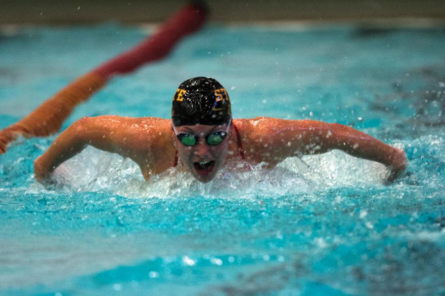 Elizabeth Kleiner, sophomore in microbiology, practices the butterfly stroke in the Beyer Hall pool Tuesday, Oct. 9. The Cyclone womens swimming and diving team practiced for the upcoming competition. 
