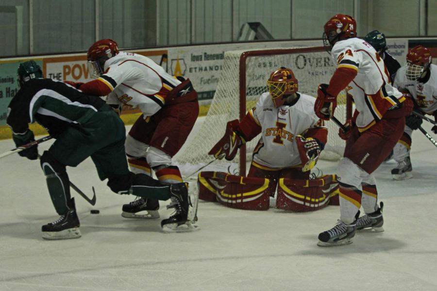 The Cyclones fight to keep the Ohio Bobcats from scoring Friday, Oct. 25. Goalie Matt Cooper saved this goal, but the Cyclones ultimately lost the game to the Bobcats, 1-0.