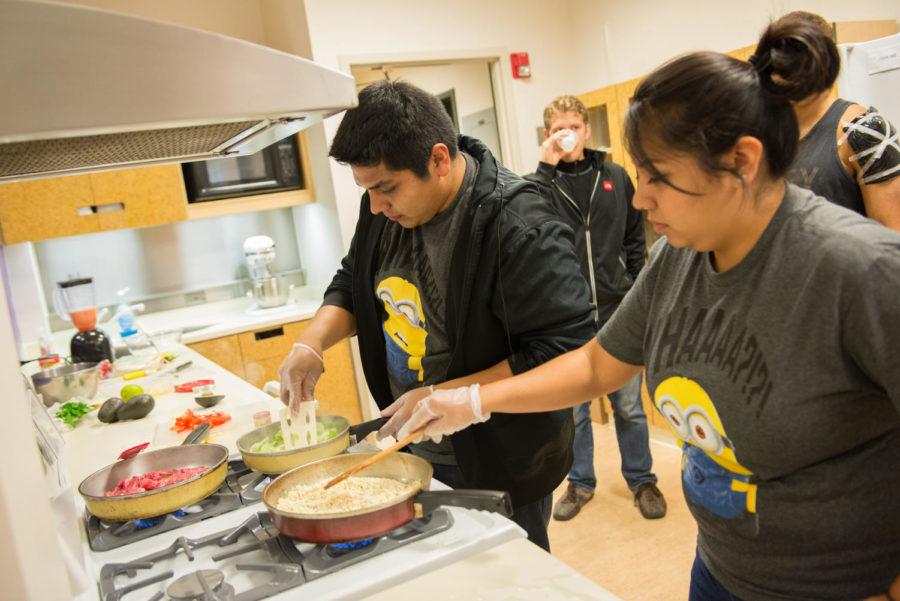 Javier Tello Guillen and Irma Tello, who got third place in Top Chef Latino 2013 competition, are cooking their dishes in 210 MacKay Hall. 