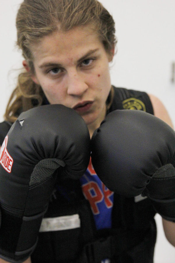Olivia Meyer, sophomore in biology, is the only female member of the boxing club. Due to lack of female presence in the sport, finding competition at other schools is rather difficult. She won her first college fight on Sept. 28. 