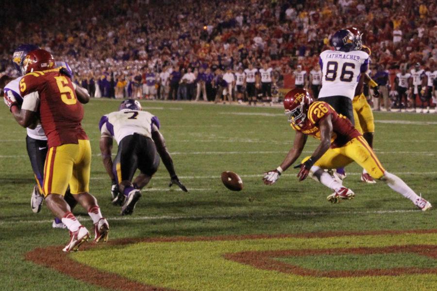UNI junior running back David Johnson fumbles the ball near the endzone in the last minutes of the game against the Cyclones on Aug. 31 at Jack Trice Stadium. Cyclones defensive back Deon BroomfieldCQ picked up the fumble giving the Cyclones a last chance but to no avail the Cyclones lost 20-28.