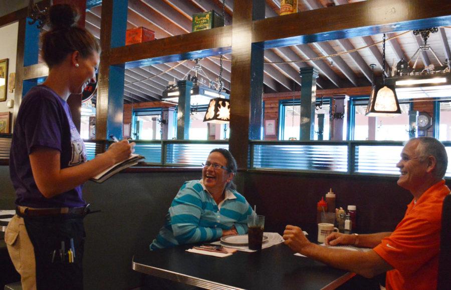 Rhonda and Roger Reker enjoy their time at Hickory Park with their friendly server Breanna OTool on Wednesday, Oct. 9.