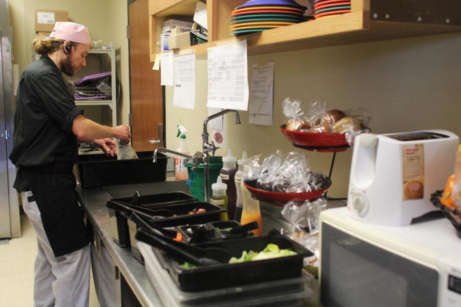 Chef Marshall Weeks cleans up after preparing a meal in the special diet kitchen located in Union Drive. Weeks prepares special meals for about 15 students who have food allergies.