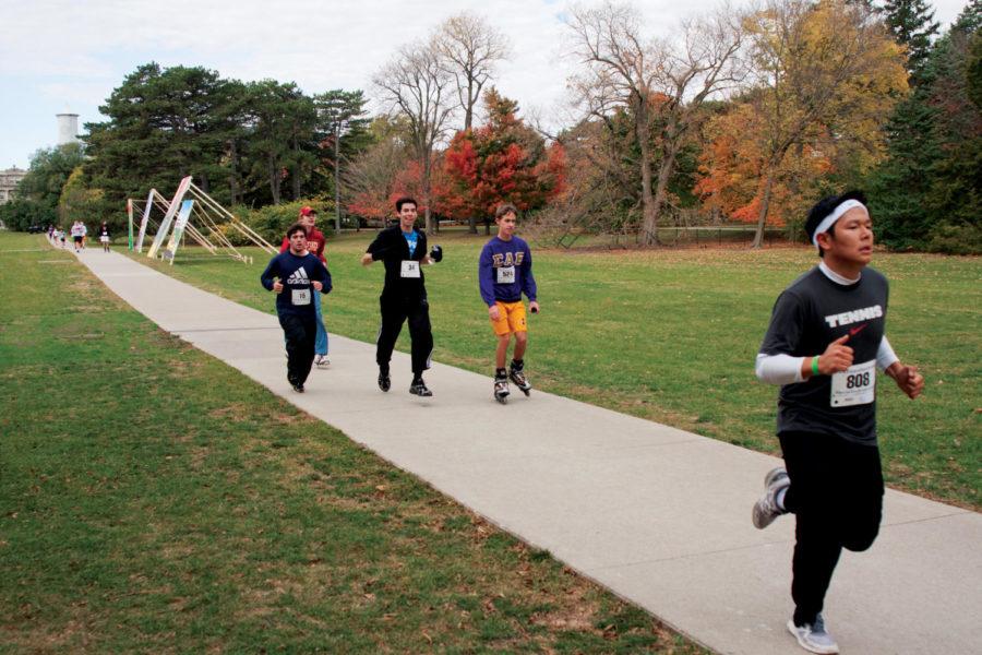 Students run on Central Campus as they near the finish line for
the Blue Sky Days 5k race on Saturday, Oct 15. Lutheran Services of
Iowa puts on the race ever year for a fundraiser to help children,
families and indiviuals in Story Country.
