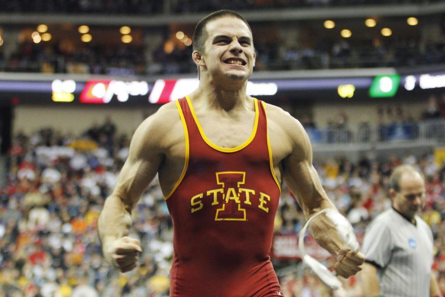 Redshirt sophomore Michael Moreno celebrates after defeating Michigan’s Taylor Massa by 17-2 technical fall during the fifth round of the 165-pound wrestlebacks at the 2013 NCAA Wrestling Championships on Friday, March 22, 2013, at Wells Fargo Arena in Des Moines. This win assured Moreno status as an All-American.
