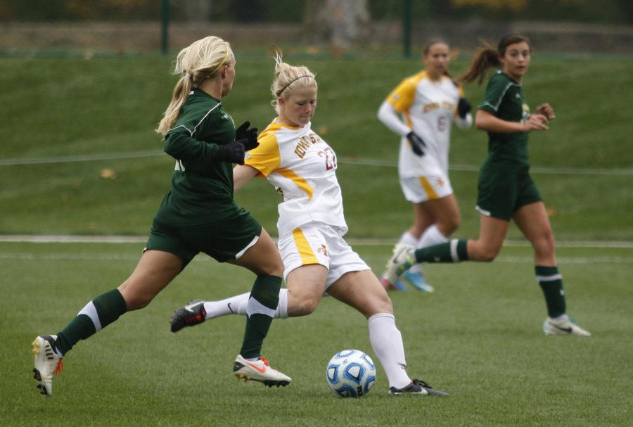 No. 27 senior midfielder Theresa Kucera ran downfield with a Baylor defender while dribbling the ball during the Big 12 Championship tournament game at Swope Soccer Village in Kansas City, Mo. The Cyclones fell to the Bears 1-0, ending the Cyclones season. 