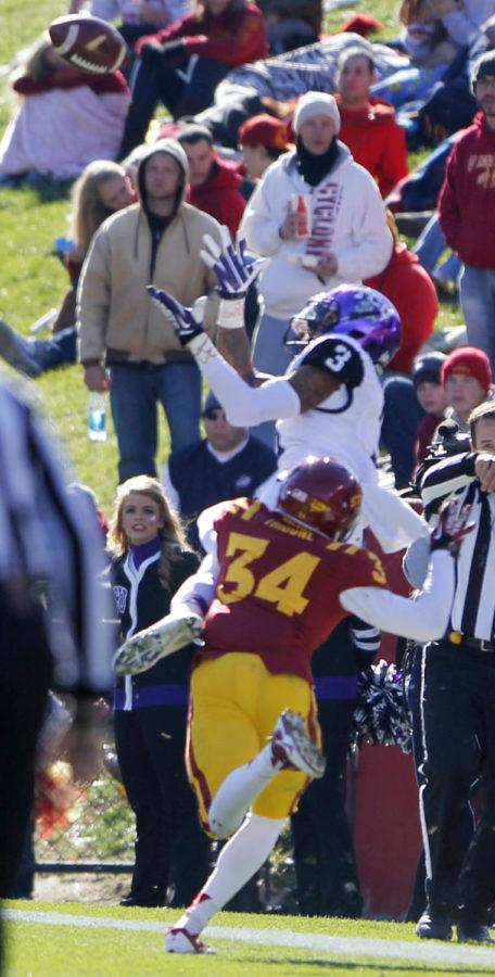 Freshman defensive back Nigel TribuneCQ attempts to break up the pass to junior TCU wide receiver Brandon Carter during the Homecoming game on Nov. 9 at Jack Trice Stadium. Tribune had six total tackles in the 17-21 defeat.