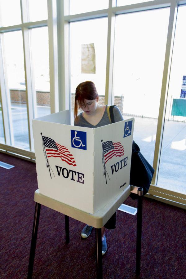 Samantha Nimmo votes for her choice Tuesday, Nov. 6, at the Collegiate United Methodist Church on Lincoln Way. Churches, schools and ISU residence halls were converted into polling locations for Election Day.
