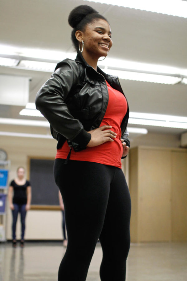 Denisha Mixon, sophomore in journalism and mass communication, poses for judges during tryouts for the 2014 Fashion Show, held in LeBaron Hall on Thursday, Nov. 7.