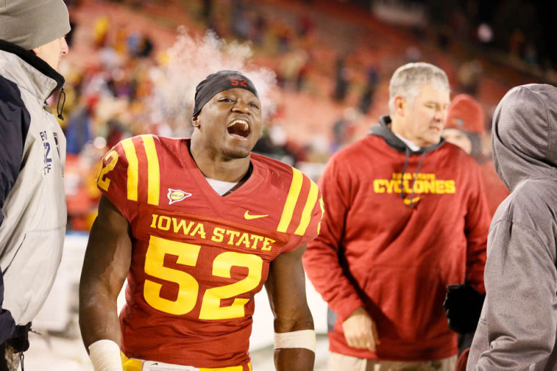 Senior linebacker Jeremiah George celebrates as steam emanates from his body after defeating the Kansas Jayhawks 34-0 at Jack Trice Stadium on Nov. 23. The temperature during the game dipped as low as 3 F.