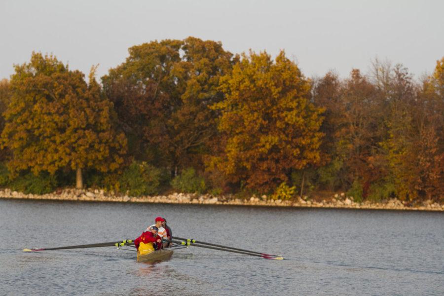 Members of the ISU Crew Club prepare their boat and row in a small lake north of Nevada, Iowa. All rowers have been rowing for at least one year.
