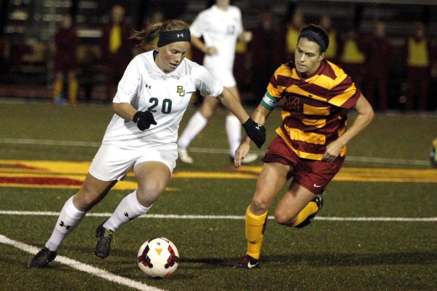 No. 14, ISU senior midfielder Meredith Skitt, positions herself to make a tackle on the ball during the 1-0 win against Baylor on Oct. 18 at the Cyclone Sports Complex.