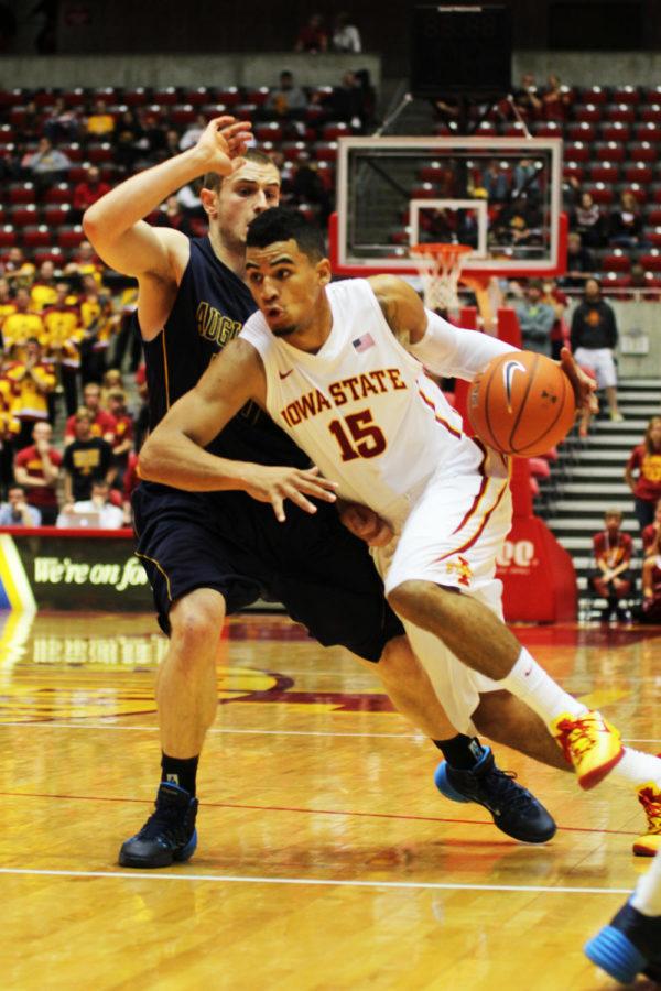 Sophomore+Naz+Long+drives+the+ball+down+the+court+during+the+exhibition+game+against+Augustana+on+Sunday%2C+Nov.+3%2C+at+Hilton+Coliseum.+The+Cyclones+won+90-68.