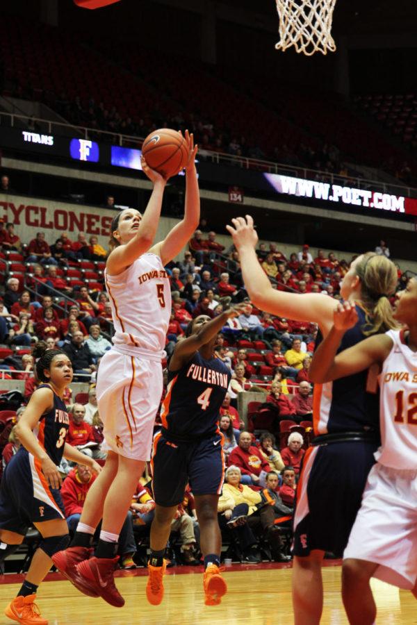 ISU senior Hallie Christofferson attempts to score against Cal State Fullerton on Sunday, Dec. 8, in Hilton Coliseum. Christofferson scored 33 points in the Cyclones 79-52 win over the Titans.
