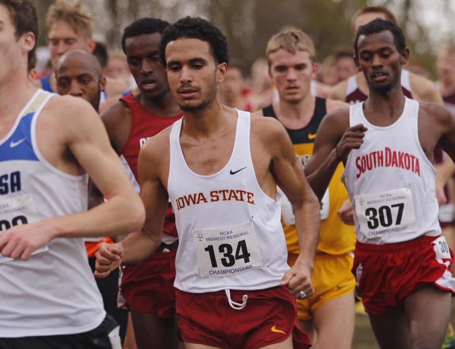 Senior Mohamed Hrezi runs amidst a group of runners from other schools during the regional cross-country meet on Friday, Nov. 15, in Ames. Hrezi finished fourth in the men’s 10K race, earning himself a trip to the national meet.