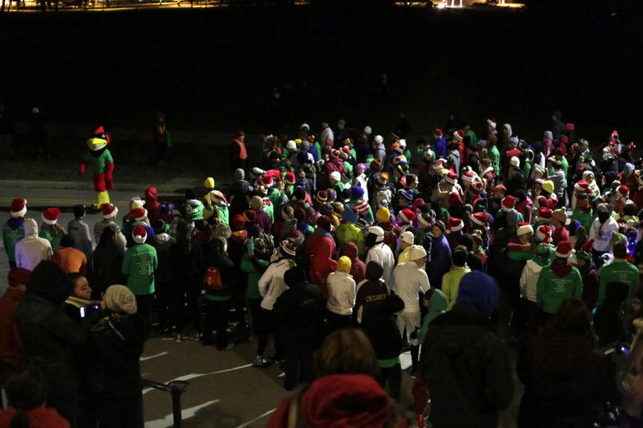 Students line up in front of Curtis Hall in subzero temperatures to run the Jingle Jog race. Students dressed up in festive outfits as part of the race.