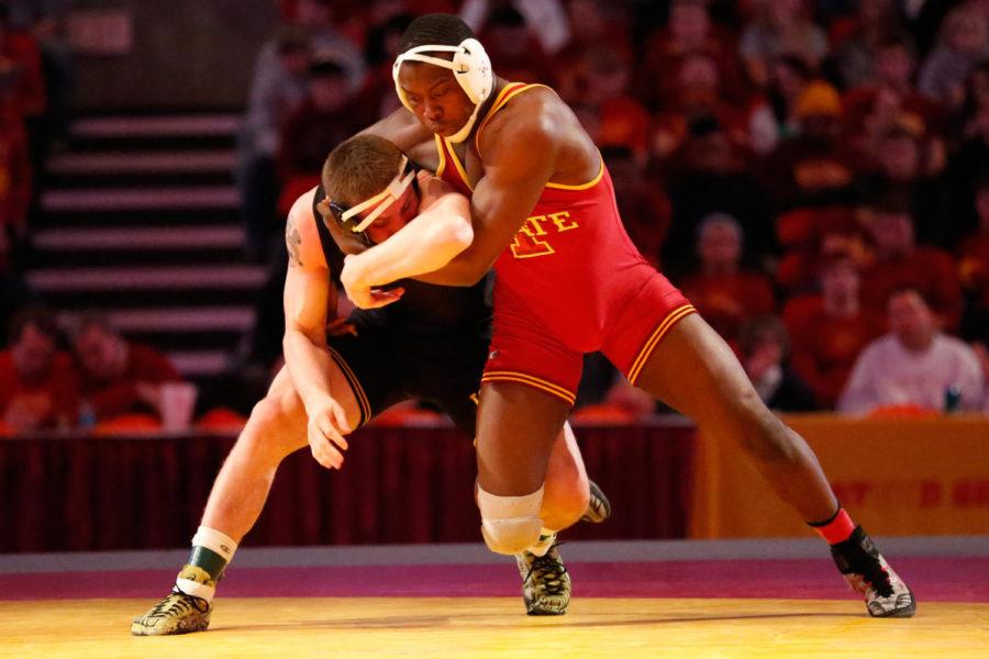 Redshirt+sophomore+Kyven+Gadson%2C+197+pounds%2C%C2%A0grapples+with+Iowas+Sam+Brooks+on+Dec.+1+at+Hilton+Coliseum.+Gadson+won+the+match+by+decision.+Iowa+State+lost+the+dual+to+Iowa+23+points+to+9.