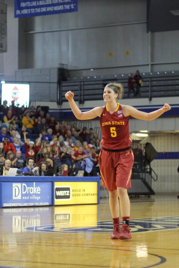 Senior forward Hallie Christofferson celebrates after her teammate scores a point for the Cyclones on Sunday afternoon, Nov. 24, in Des Moines. The Cyclones won against the Drake Bulldogs with a final score of 89-47.