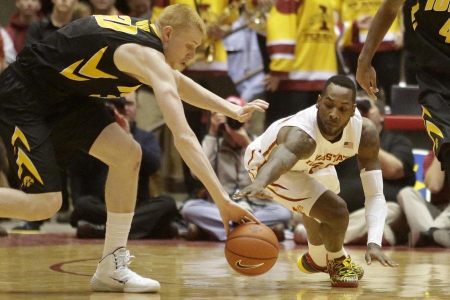 Senior guard DeAndre Kane scrambles for a loose ball during Iowa States 85-82 win over Iowa Dec. 13, 2013 at Hilton Coliseum. Kane had five points and nine assists on the night.