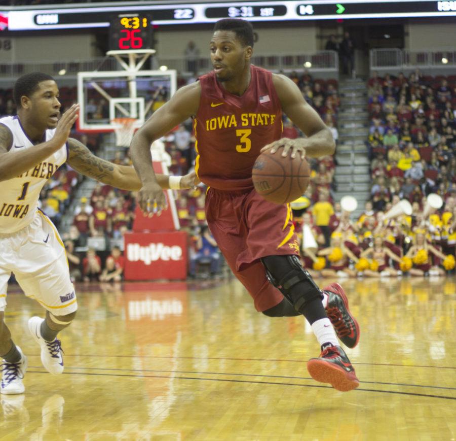 Senior Melvin Ejim flies down the court against Northern Iowa on Saturday, Dec. 7 at Wells Fargo Arena in Des Moines.  Ejim finished the game 9 for 13 in shots taken.
