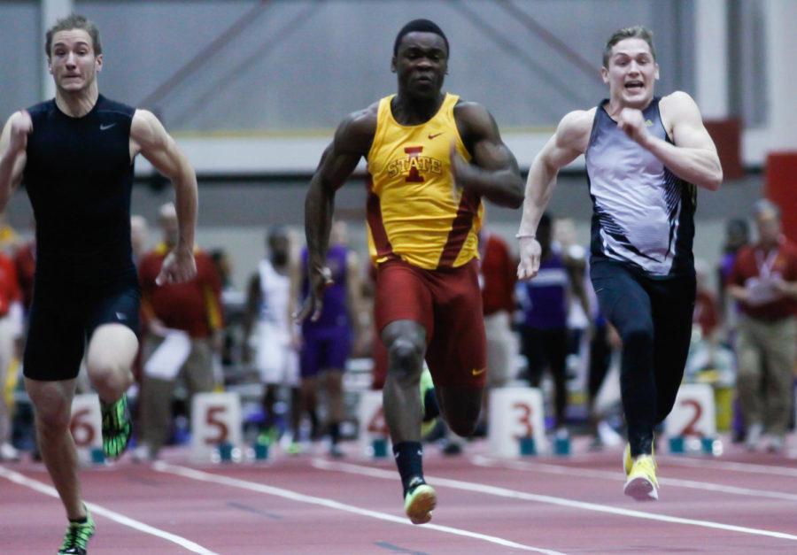 Junior Ivan Tamba runs the 100m during the Holiday Classic on Dec. 6 at Lied Recreation Center.