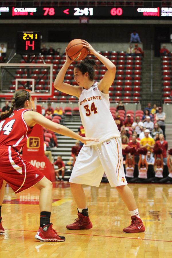 Sophomore Madison Baier looks to pass to a teammate during the game against South Dakota on Wednesday, Nov. 13.