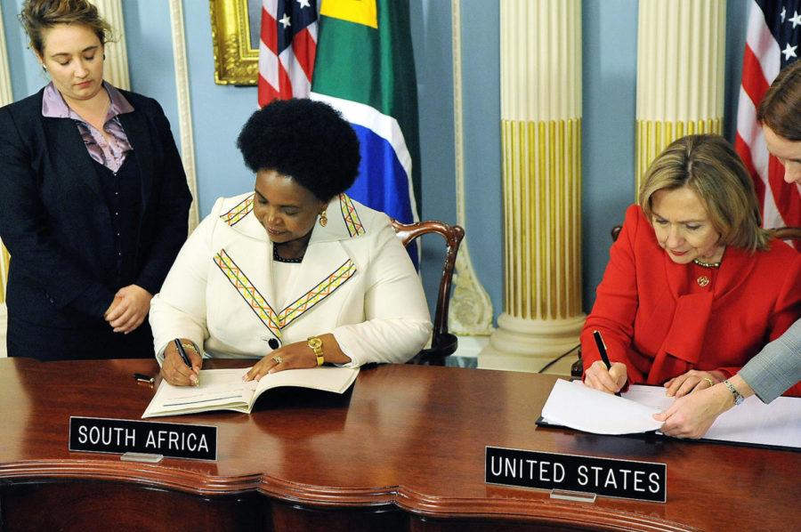 Then-U.S.+Secretary+of+State+Hillary+Clinton+and+South+Africa%E2%80%99s+Minister+Maite+Nkoana-Mashabane+sign+the+PEPFAR%2C+a+program+that+offers+funding+for+AIDS+relief+worldwide.+Although+lawmakers+have+given+attention+to+the+AIDS+pandemic%2C+many+wonder+if+more+can+be+done.%C2%A0