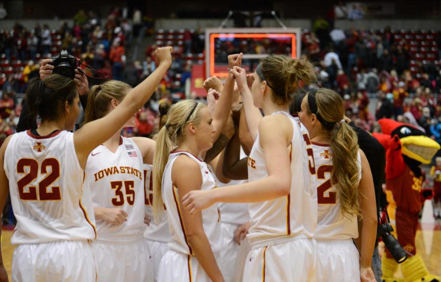 The ISU womens basketball team celebrates their 83-70 win against Iowa on Dec. 12 at Hilton Coliseum. Iowa State has scored over 80 points six times in nine games.