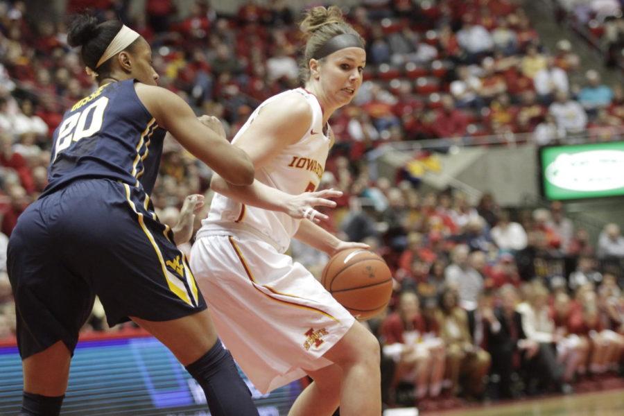 Hallie Christofferson gets into the paint against West Virginia on Jan. 15 at Hilton Coliseum. The Cyclones lost to the Mountaineers 59-73. 